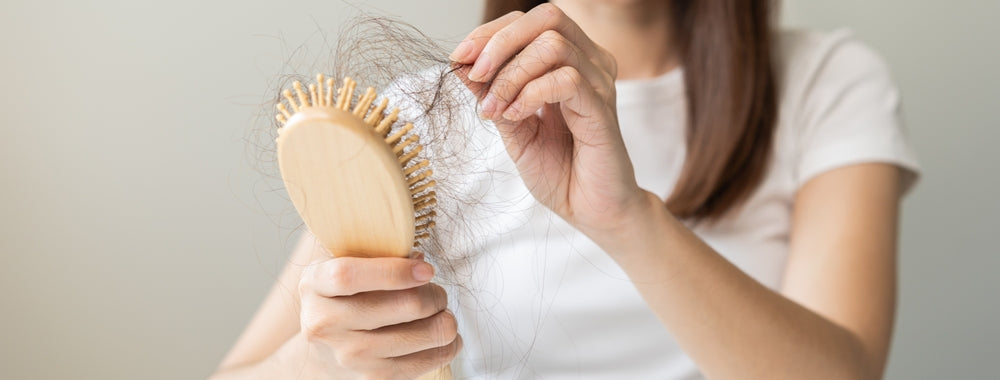 Girl brushing her hair